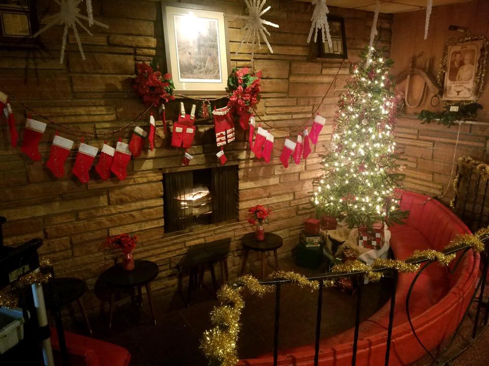 A Christmas tree and stockings at Dude's Steakhouse.