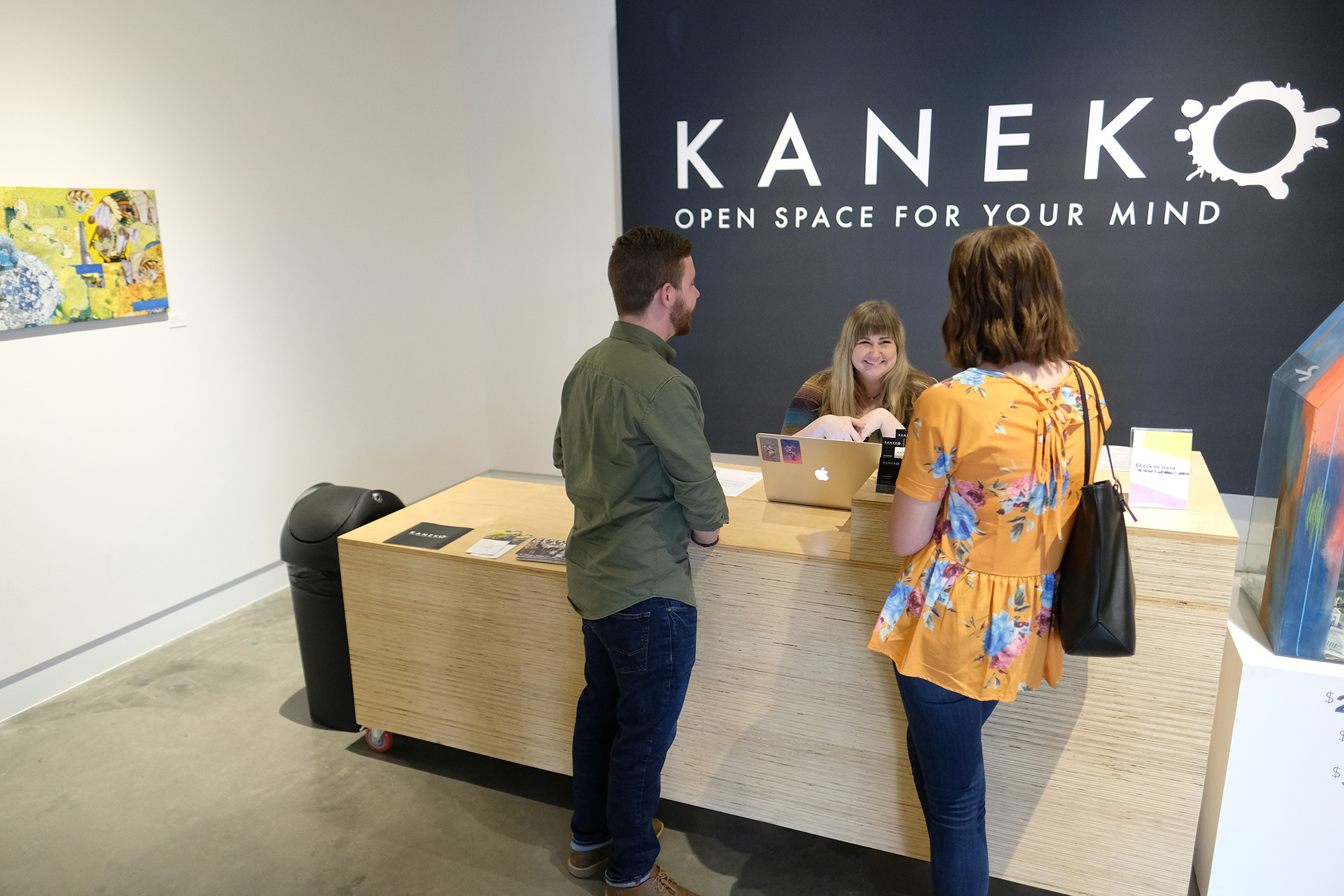 A couple at the counter inside Kaneko.