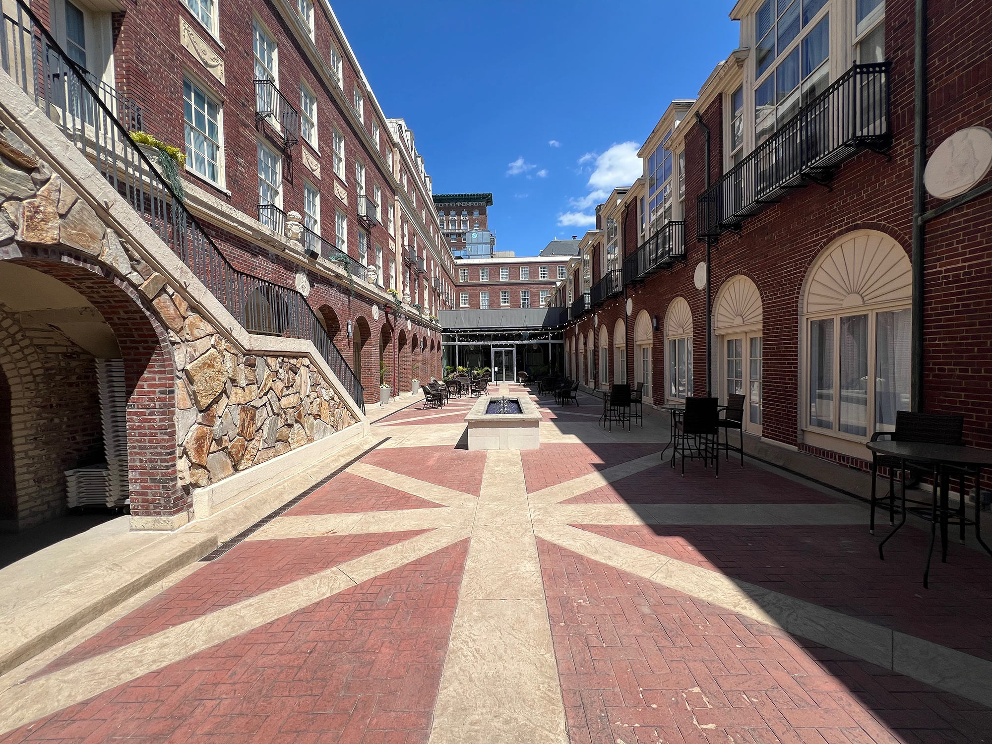 The brick courtyard of Magnolia Hotel in Omaha