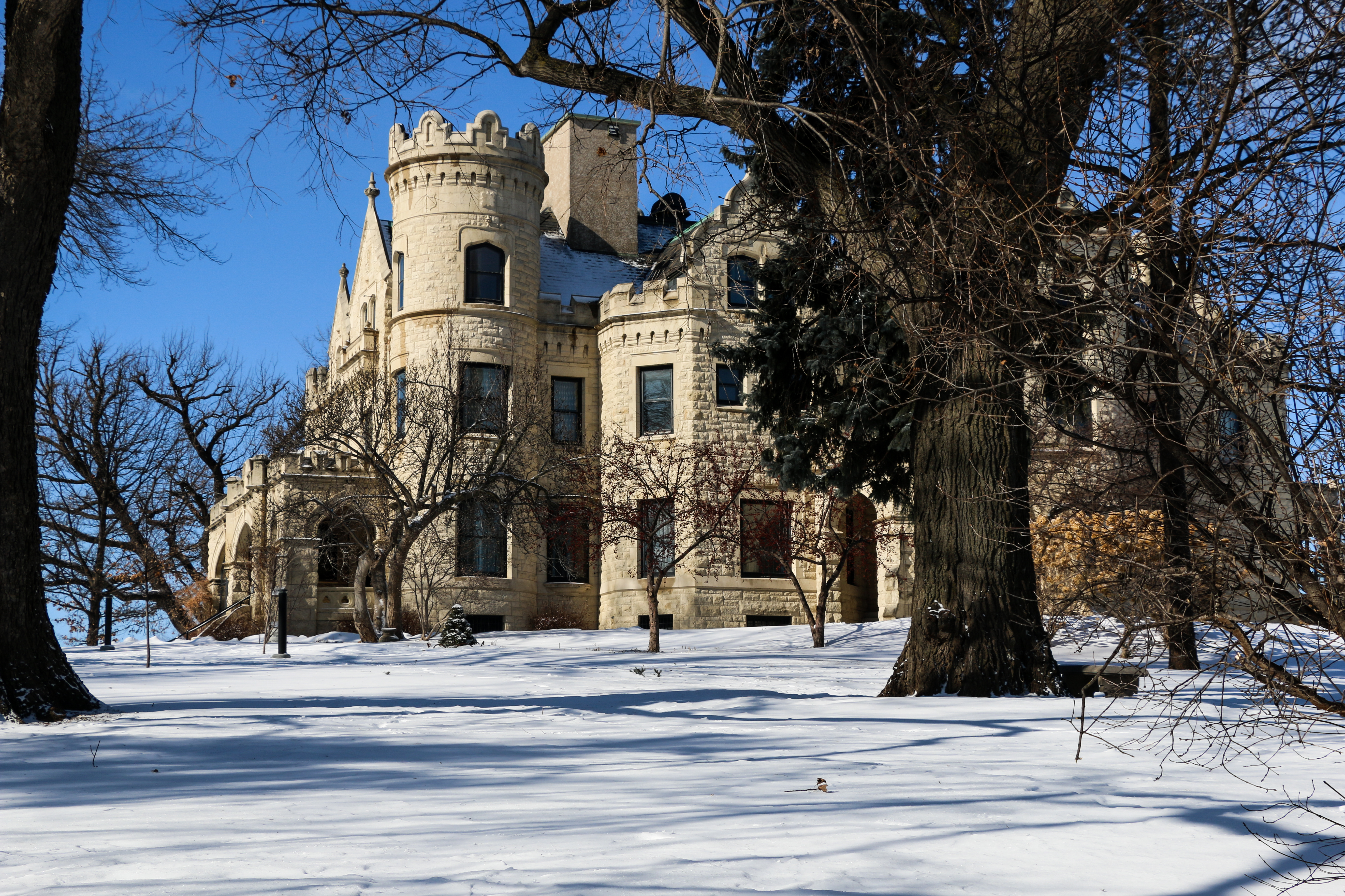 The exterior of Omaha, Nebraska's Joslyn Castle & Gardens after snow has fallen