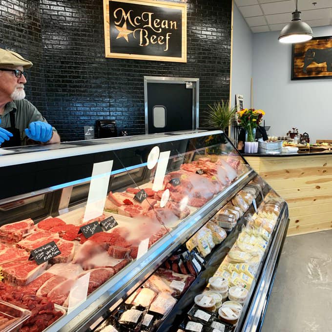 Butcher behind the counter at Mclean Beef in York.