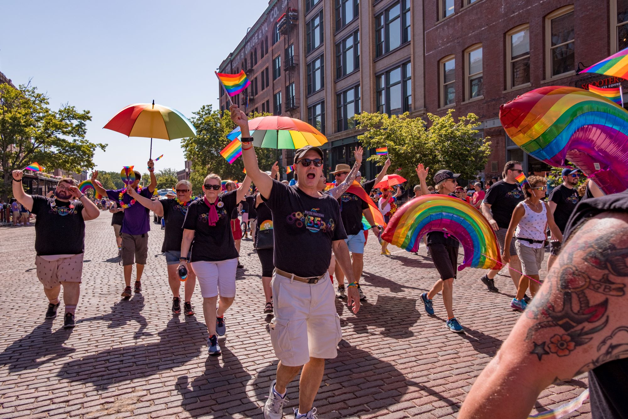 People marching at the Omaha Pride Parade.