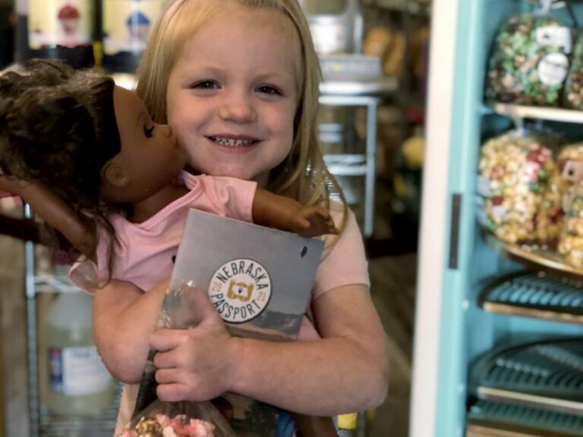 Girl with doll & popcorn